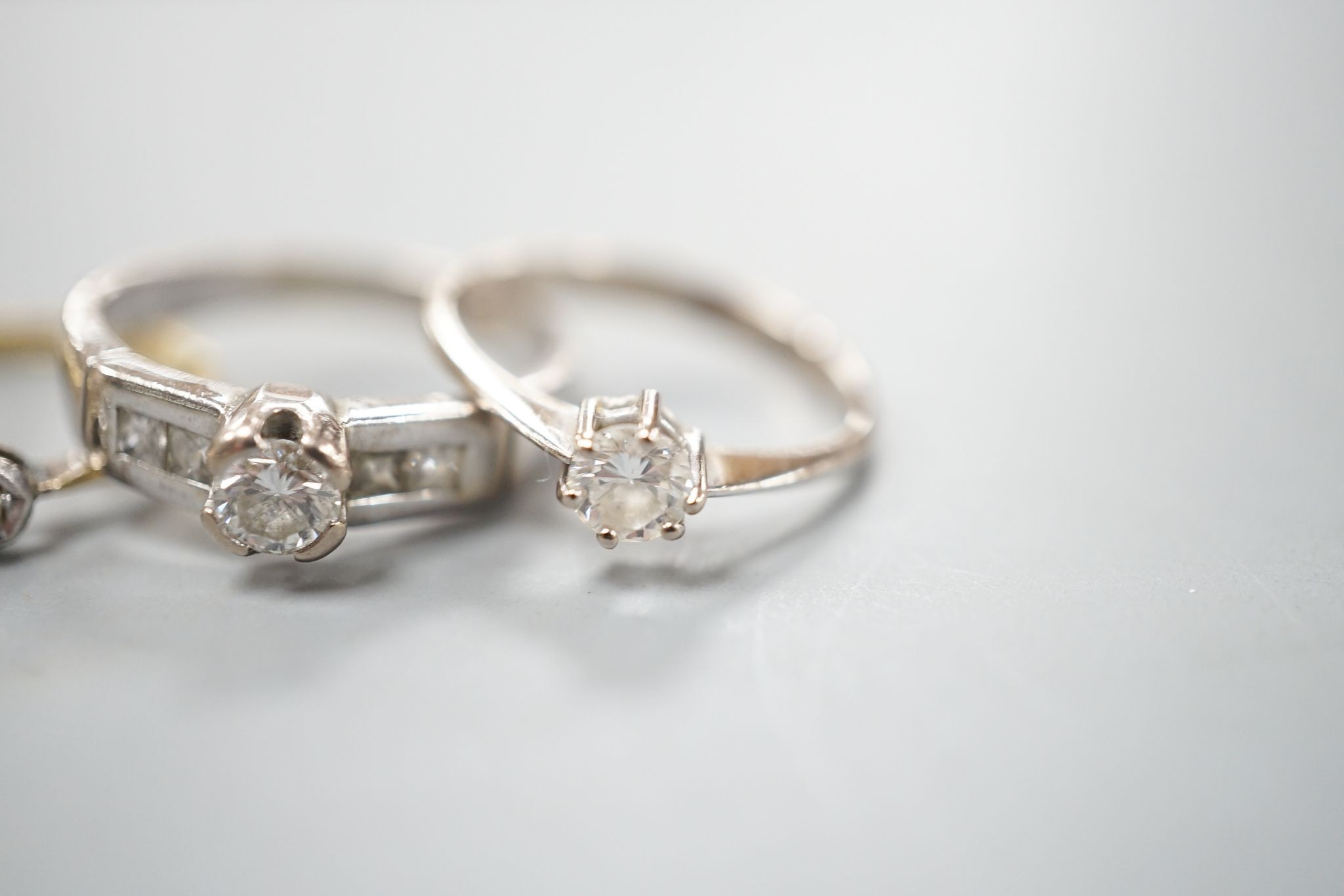 Four assorted diamond dress rings including two 18ct and two white metal, gross 10 grams